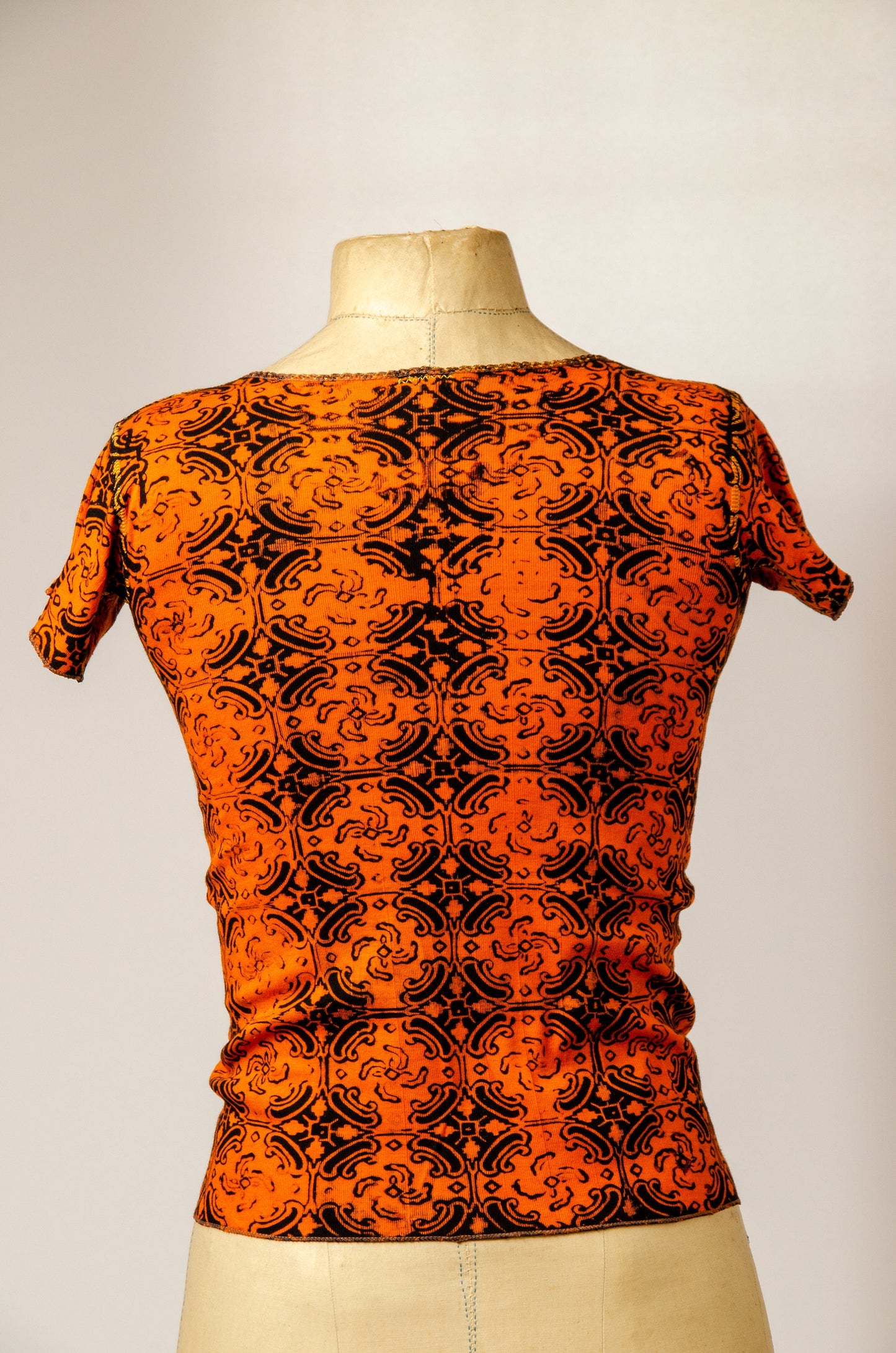 1970s  Deadstock Hippie Batik Orange and Black Babyrib Cotton T Shirt