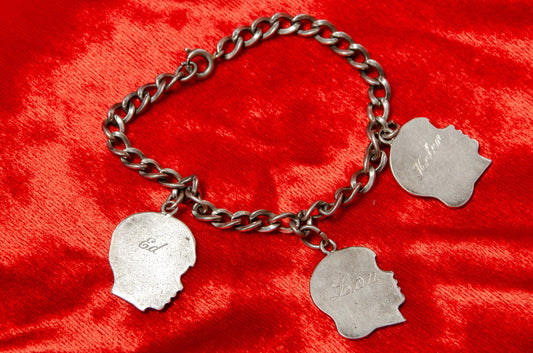 1940s Sterling Silver Children's Head Charm Bracelet